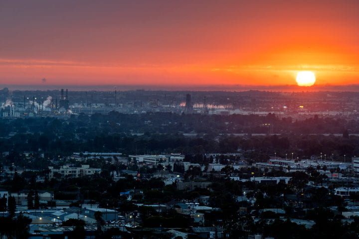 The ports, refineries and petrochemical plants of Greater Los Angeles are major emitters of greenhouse gases. A recent study conducted by UC Irvine researchers concluded that replacing fossil fuels with renewable hydrogen in applications such as steelmaking, transoceanic shipping and heavy-duty freight trucking would provide the greatest social benefit in terms of reduced climate impacts and air pollution and improved public health. Steve Zylius / UC Irvine