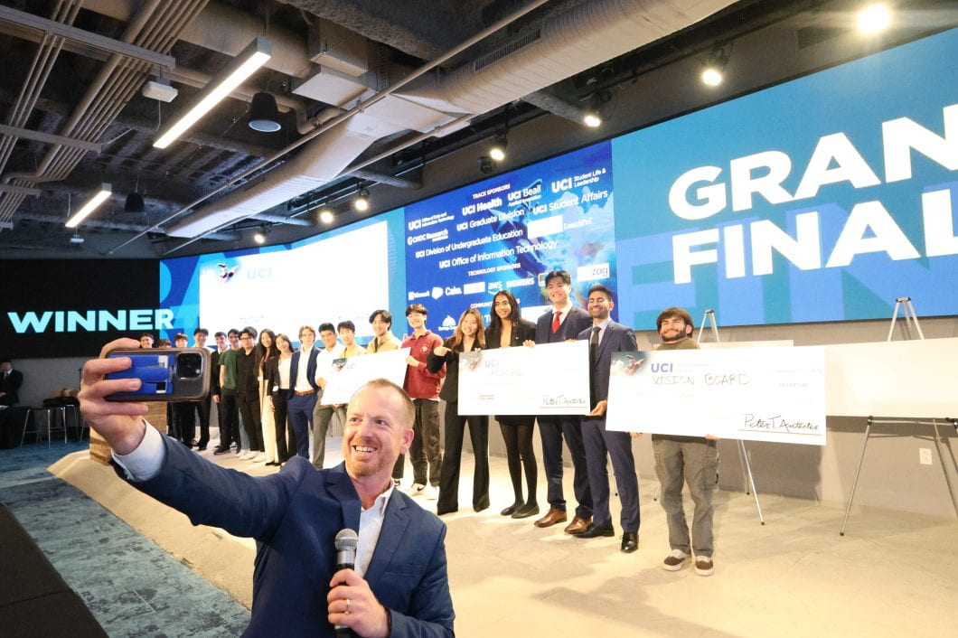 ANTrepreneur Center director Ryan Foland takes a selfie with participants in the AI Innovation Challenge. Angie Delfin / ANTrepreneur Center ANTrepreneur Center director Ryan Foland takes a selfie with participants in the AI Innovation Challenge. Angie Delfin / ANTrepreneur Center