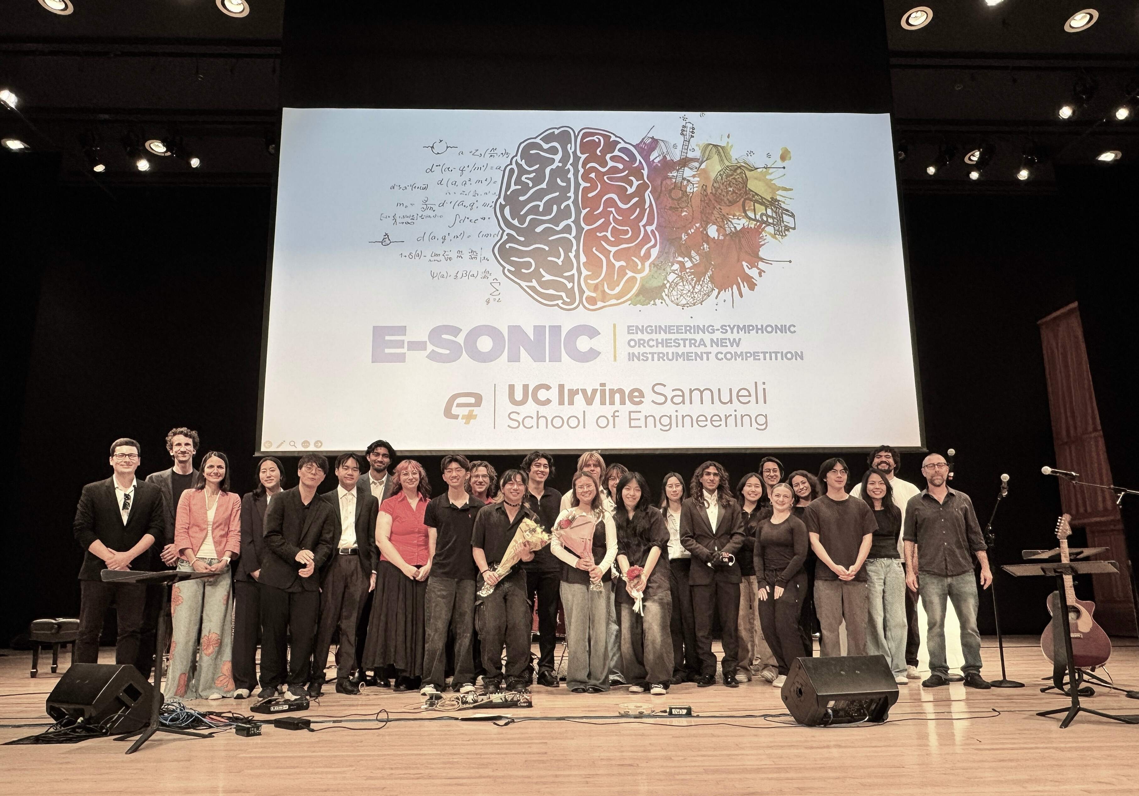 Student teams and faculty mentors of E-SONIC on stage at Winifred Smith Hall