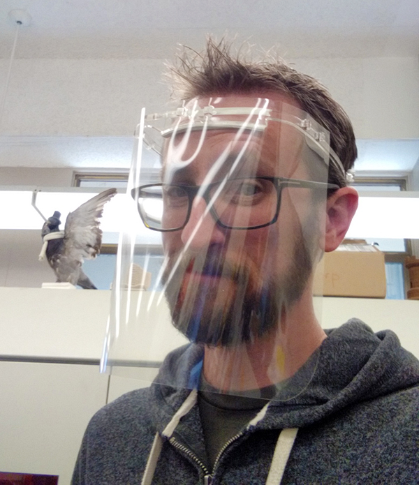 Ben Dolan (above) models the UCI face shield he designed with the help of UCI studio art Associate Professor Jesse Jackson. Ben Dolan (above) models the UCI face shield he designed with the help of UCI studio art Associate Professor Jesse Jackson.