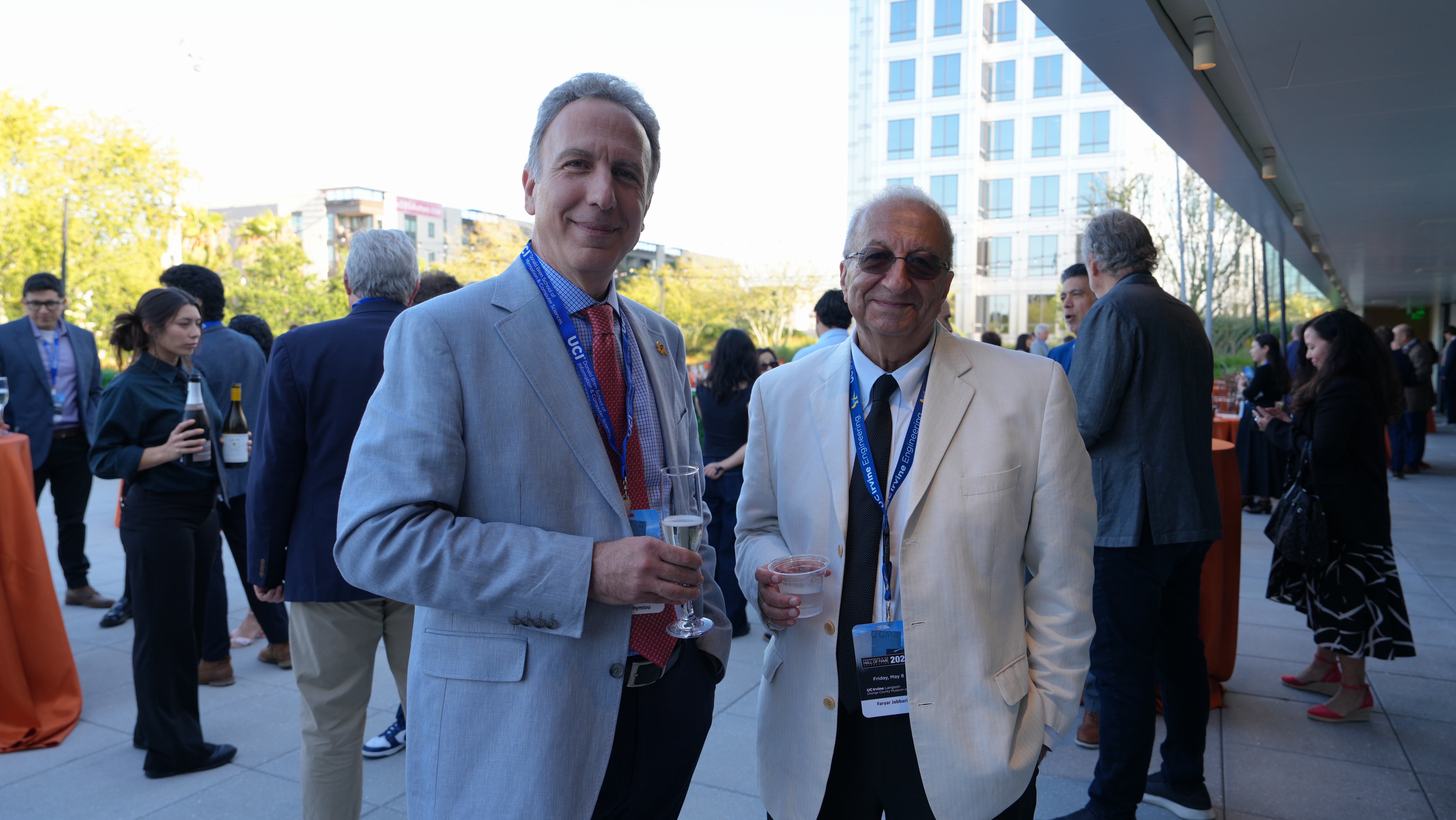 This is the 11th year that the schools of engineering and ICS have held the Alumni Hall of Fame event. ICS Dean Marios Papaefthymiou (left) and interim Engineering Dean Faryar Jabbari enjoy the evening.