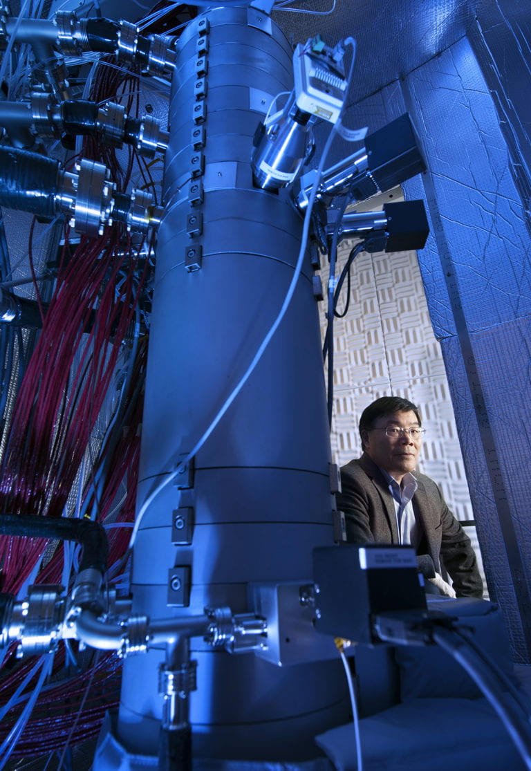 Xiaoqing Pan, UCI professor of materials science and engineering and physics, Henry Samueli Endowed Chair in Engineering, and director of the Irvine Materials Research Institute is seated next to IMRI’s Nion Ultra Scanning Transmission Electron Microscope. The instrument was used to make atomic-scale observations of phonon interactions in crystals, the subject of a new paper in Nature. Steven Zylius / UCI Xiaoqing Pan, UCI professor of materials science and engineering and physics, Henry Samueli Endowed Chair in Engineering, and director of the Irvine Materials Research Institute is seated next to IMRI’s Nion Ultra Scanning Transmission Electron Microscope. The instrument was used to make atomic-scale observations of phonon interactions in crystals, the subject of a new paper in Nature. Steven Zylius / UCI