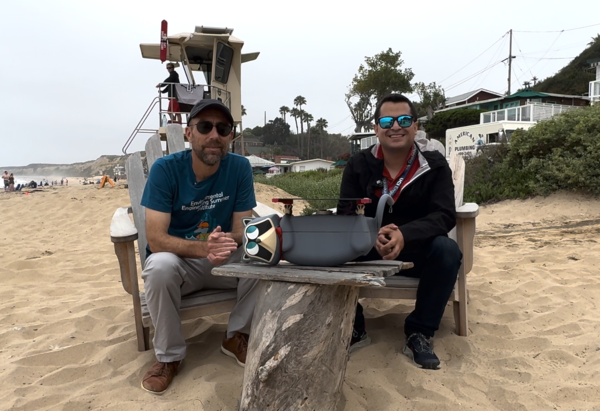 UCI engineering Dean Magnus Egerstedt and UCI researcher Efrain Mendez present the RaccoonBot at Crystal Cove State Park.