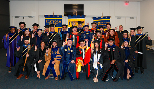 The Samueli School of Engineering commencement platform party practices their Zot, Zot, Zot! backstage. The Samueli School of Engineering commencement platform party practices their Zot, Zot, Zot! backstage.