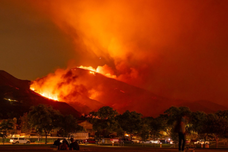 The Airport Fire rages in the Santa Ana Mountains about 20 miles from the UC Irvine campus in September 2024. “The global paradox of decreased burn area and increased human impacts we uncovered … is due largely to an increasing overlap between human settlements and fire-prone landscapes,” says study co-author Amir AghaKouchak, UC Irvine Chancellor’s Professor of civil and environmental engineering. Amir AghaKouchak / UC Irvine