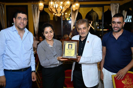 Pictured, from left, are Conference General Chair Brahim El Bhiri, Ms.  Aboutajdine, daughter of the late Driss Aboutajdine, Ayman Mosallam and Conference Co-Chair Anis Moumen. 