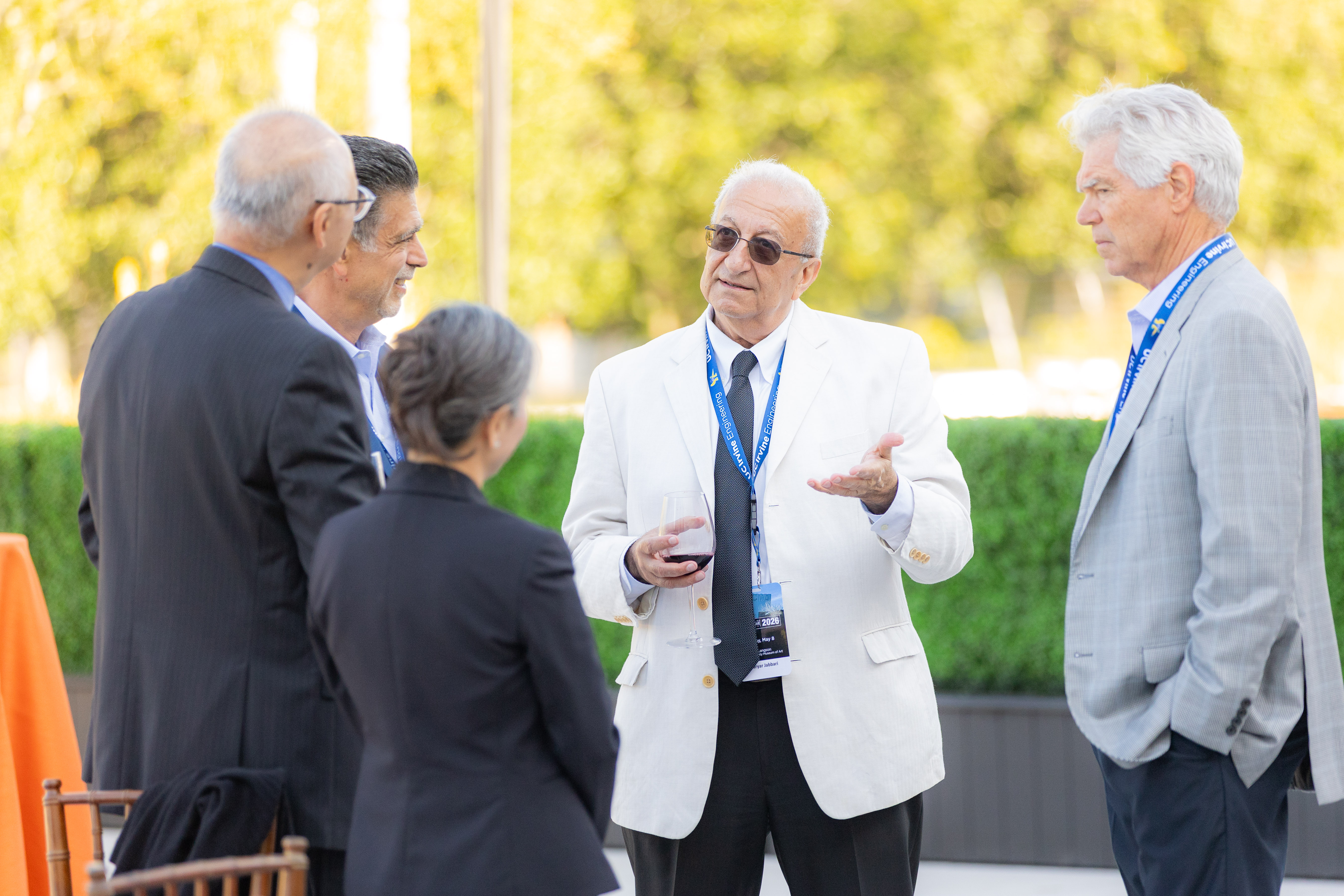 Interim Dean Faryar Jabbari chats with guests at the 2026 Engineering and ICS Alumni Hall of Fame event at the UC Irvine Langson Orange County Museum of Art in Costa Mesa.